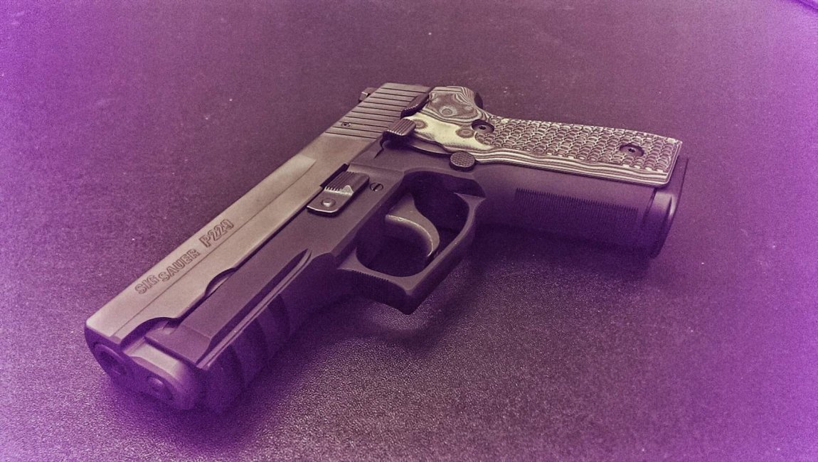 Sig P229 with G10 extreme grips 3.jpg