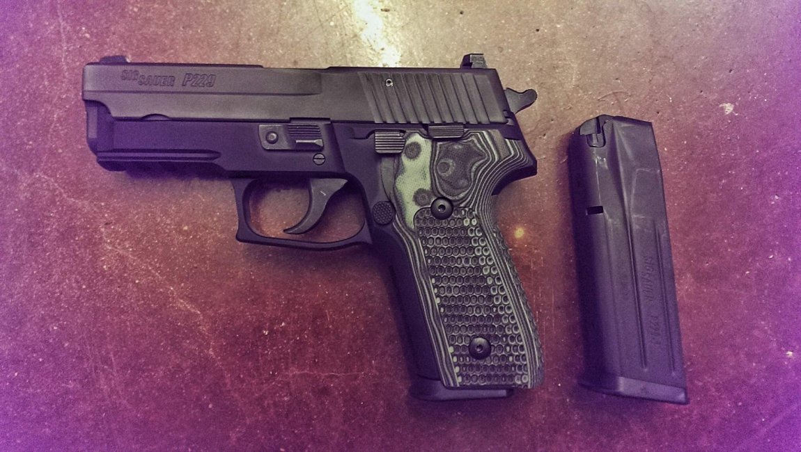 Sig P229 with G10 extreme grips 2.jpg