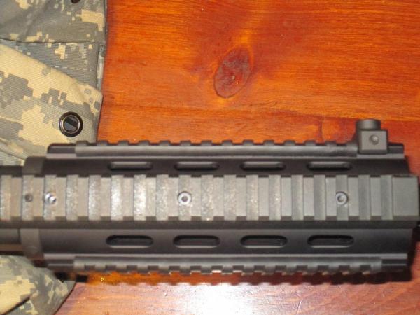 Closeup of countersunk holes to properly secure the extended rail.